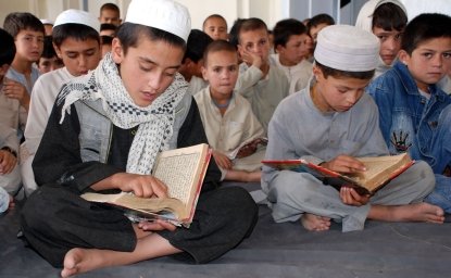Schoolboys reading the Koran in Afghanistan