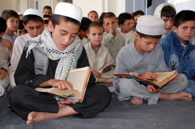 Schoolboys reading the Koran in Afghanistan
