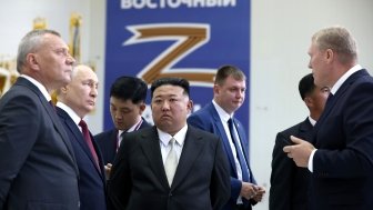 With Chairman of State Affairs of the DPRK Kim Jong-un (center) during an inspection of the Vostochny Cosmodrome. Explanations are given by the head of Roscosmos Yuri Borisov (left) and the general director of the Center for the Operation of Ground-Based Space Infrastructure Nikolai Nestechuk (right).