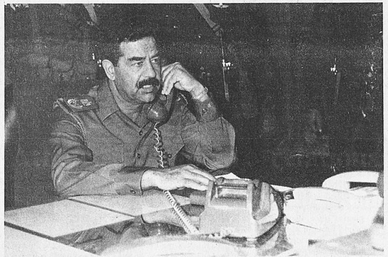 Saddam on a phone call