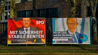 german election signs 2025 Scholz and Merz