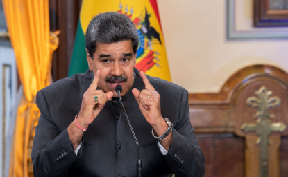 Maduro gives a speech from a desk