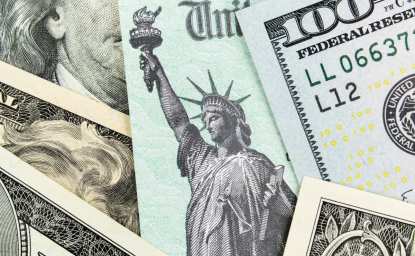 US Treasury Check with a $100 bill